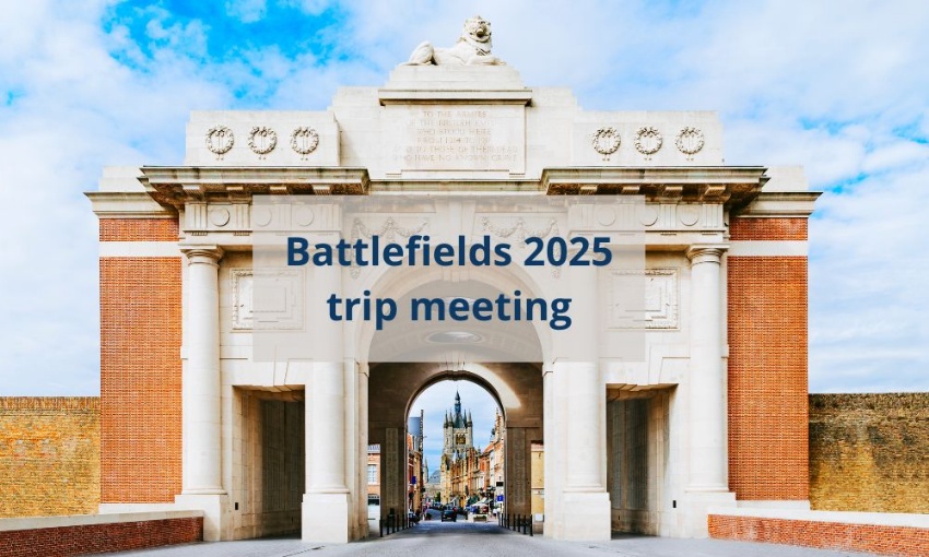 Image shows the Menin Gate war memorial in Ypres, Belgium, with the words battlefields 2025 trip meeting